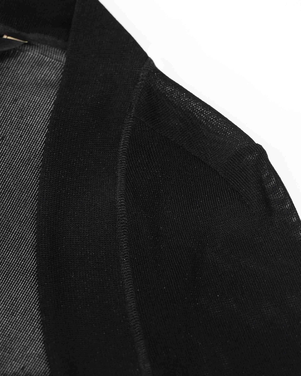 The close view reveals a dark outer edge beside a more transparent inner section.