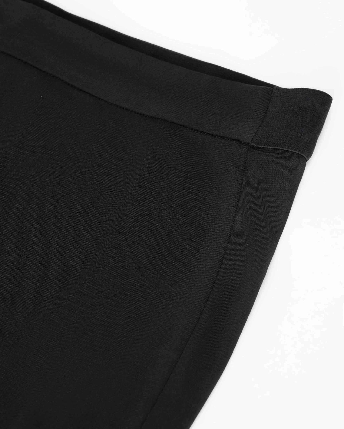 A plain waistband follows the upper edge, with a seam continuing into the skirt below.