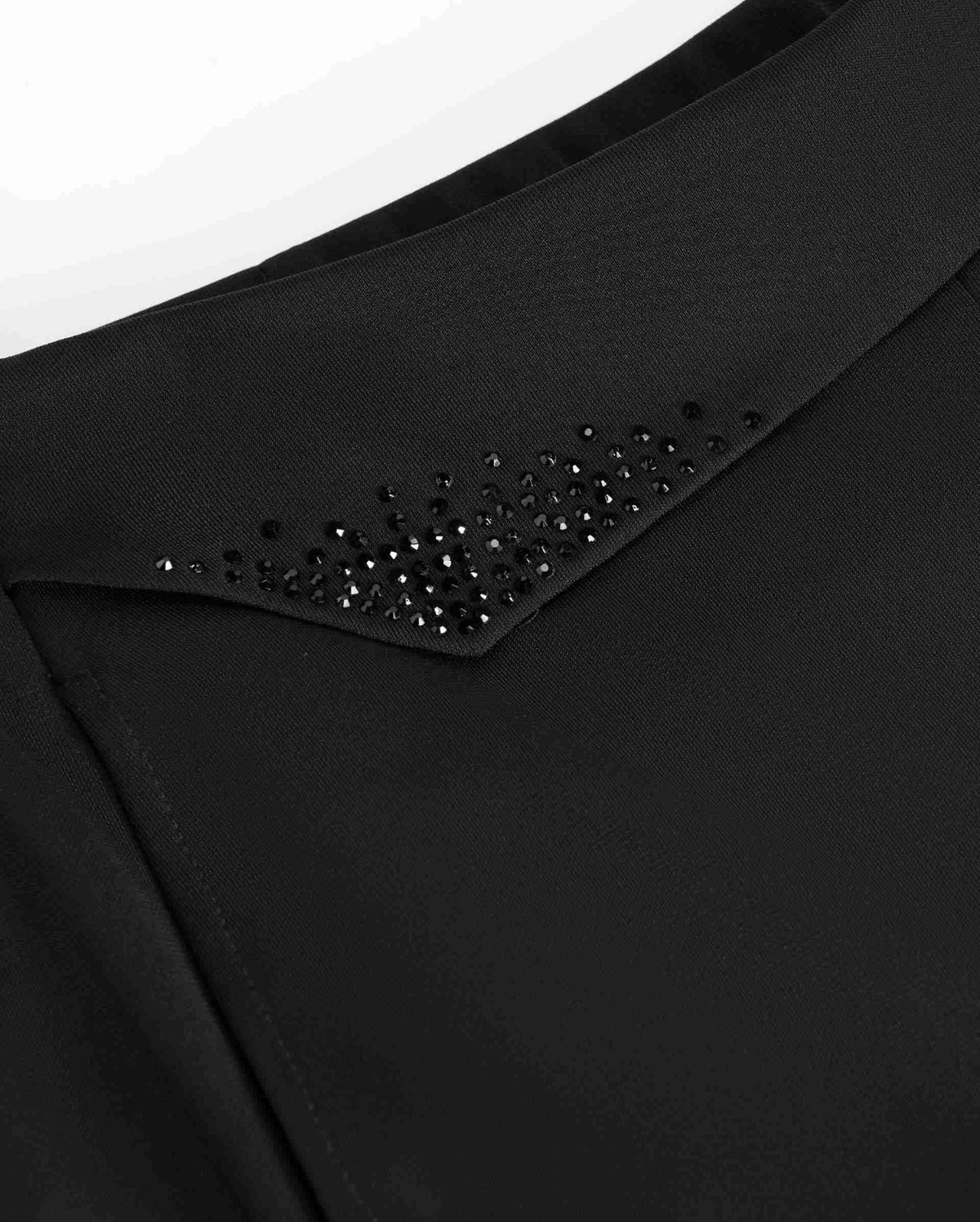 Small dark reflective accents gather along an angled waist detail.