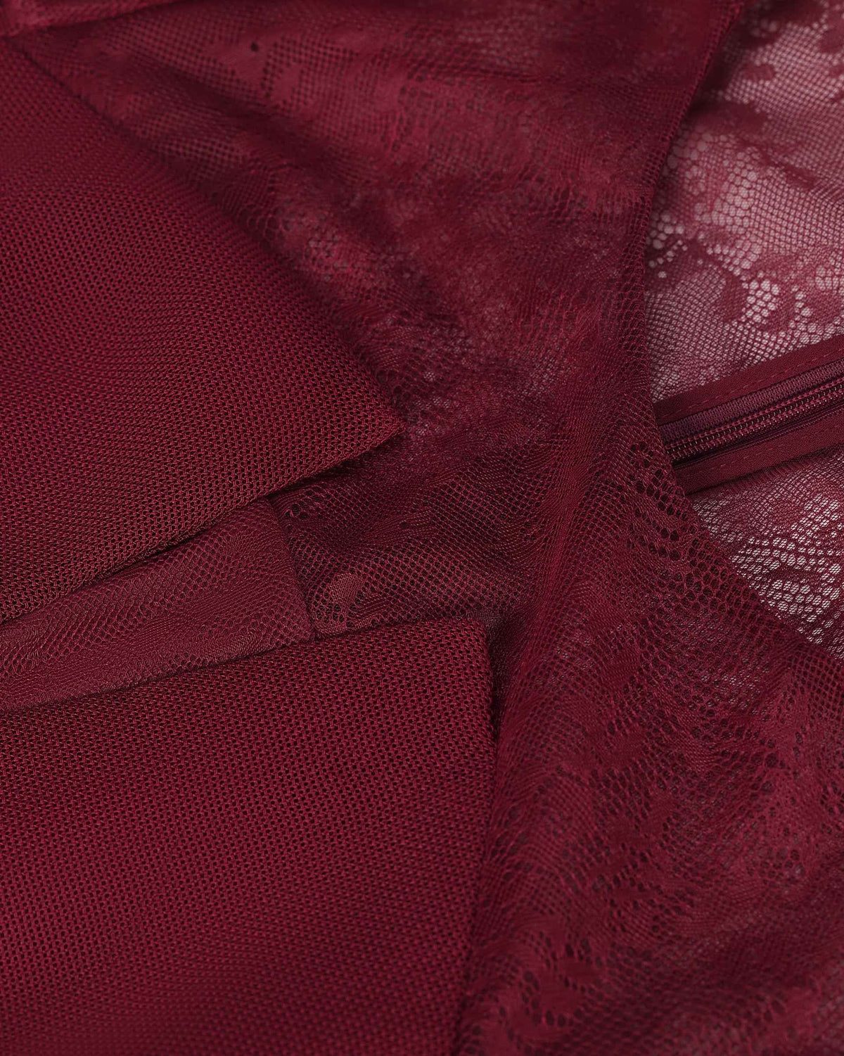 Floral lace spans the upper section against the opaque burgundy body.