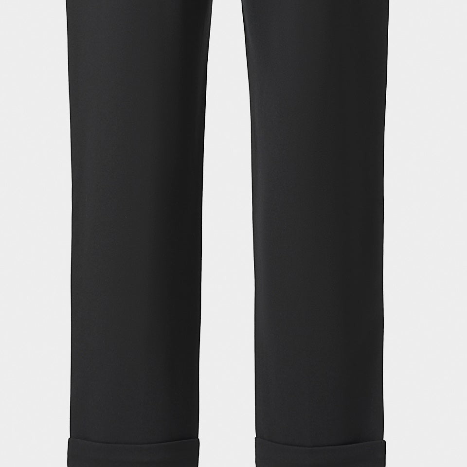 The lower back view reveals plain dark fabric continuing into clean cropped hems.